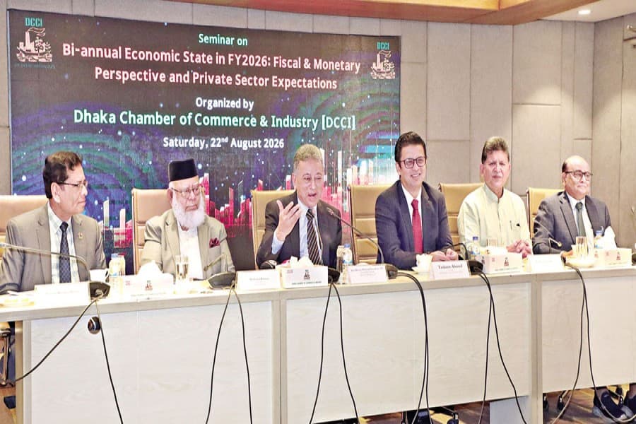 Finance and Planning Minister Amir Khosru Mahmud Chowdhury speaks as the chief guest at a seminar titled 'Biannual Economic State in FY2026: Fiscal & Monetary Perspective and Private-Sector Expectations', organised by the Dhaka Chamber of Commerce and Industry in the city on Saturday. ICC Bangladesh President Mahbubur Rahman was present as a special guest.